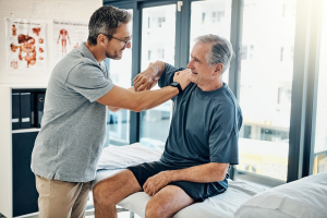 Physiotherapist helping patient with everyday aches and pains